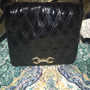 A black crossover purse